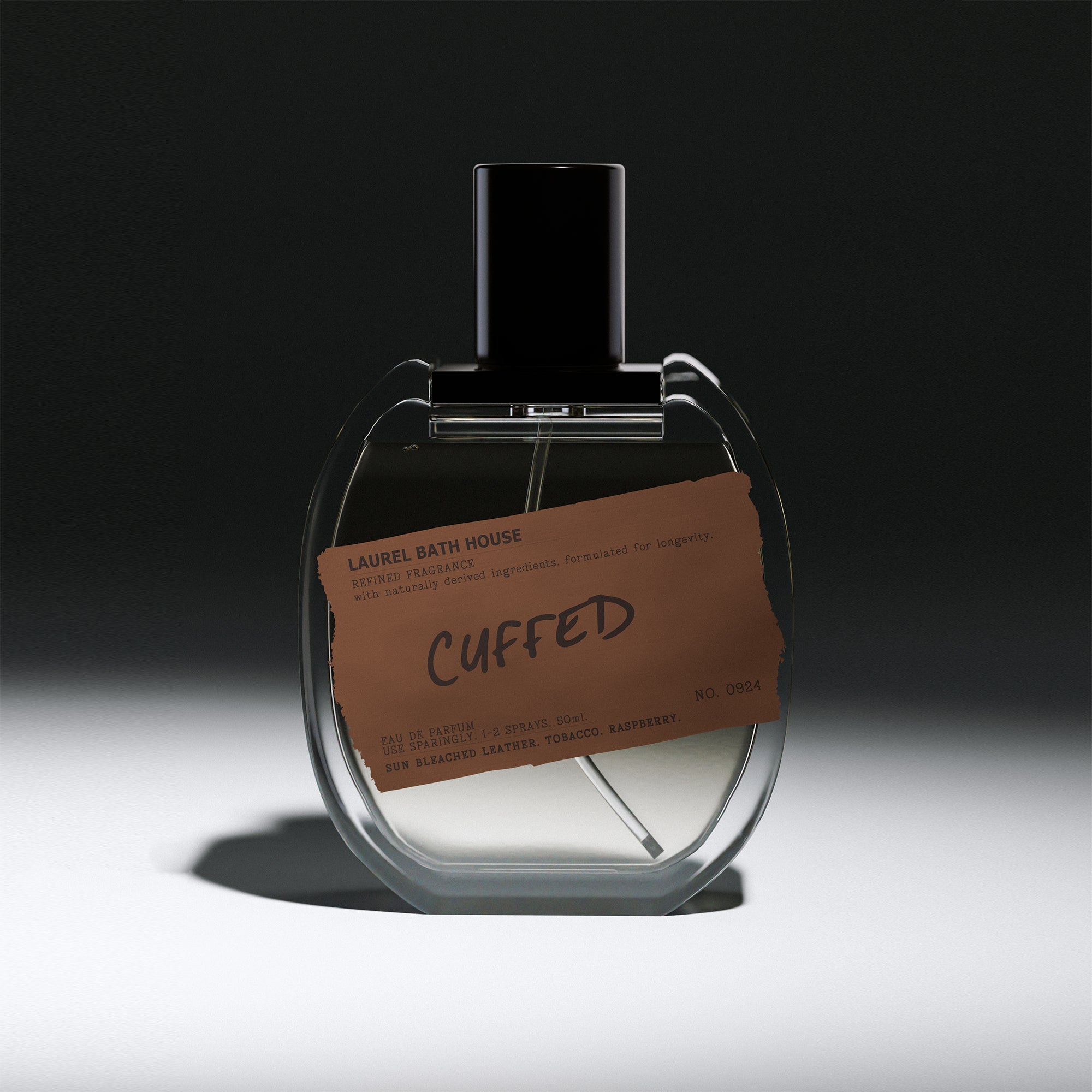 Cuffed Eau de Parfum by Laurel Bath House – leather, tobacco & raspberry scent